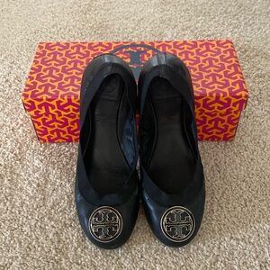 Black and gold Tory Burch flats